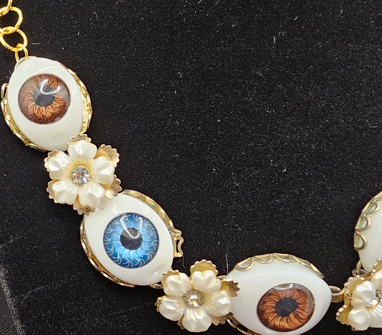 Doll Eyes on Vintage Necklace